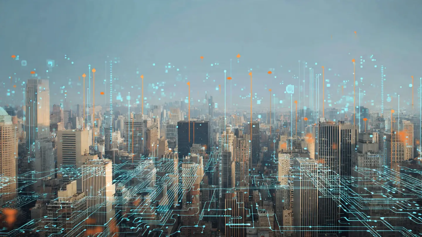 Wireframe smart city with illuminated infrastructure lines.
